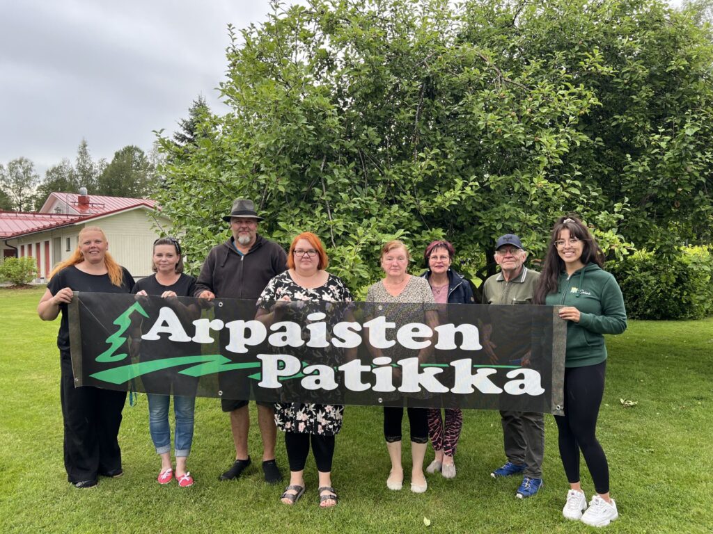 Kuvassa edustettuna tapahtuman järjestäjätahot Soinin kunta, Saurun seudun maa- ja kotitalousseura sekä Parviaisen kyläyhdistys.