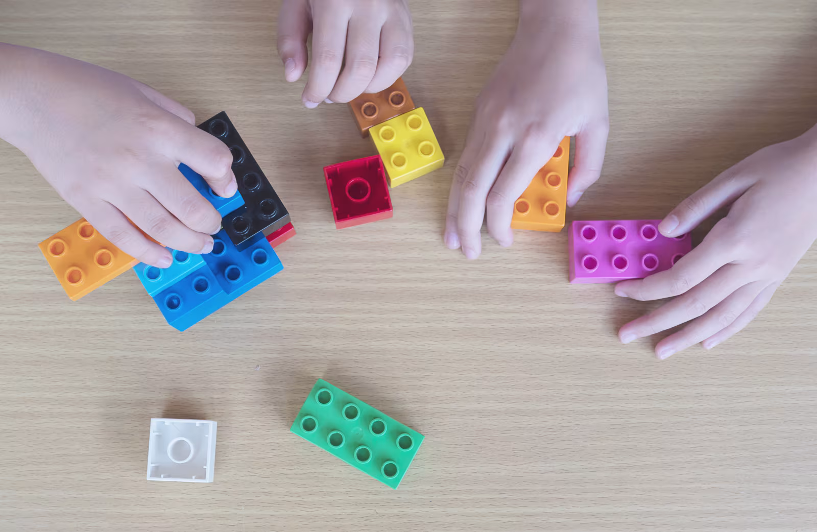Kids playing pieces plastic creative construction blocks